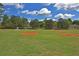 Community baseball field with multiple bases ready for a game at 4750 Spring Wood Trce, Cumming, GA 30041