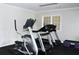Gym featuring treadmill, elliptical and exercise bench for a complete workout at 4750 Spring Wood Trce, Cumming, GA 30041