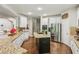 Modern kitchen boasting granite countertops, stainless steel appliances, and hardwood floors at 4750 Spring Wood Trce, Cumming, GA 30041