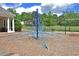 Playground with a large blue web-like climbing structure, swings, and a nearby pavilion at 4750 Spring Wood Trce, Cumming, GA 30041