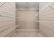Walk-in closet featuring wire shelving on all sides providing ample storage at 550 Bayswater Way, Suwanee, GA 30024