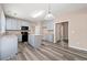 Spacious eat-in kitchen features modern stainless appliances and ample counter space at 550 Bayswater Way, Suwanee, GA 30024