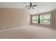 Spacious main bedroom with vaulted ceiling and many windows at 550 Bayswater Way, Suwanee, GA 30024