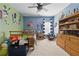 bedroom boasts baseball-themed decor, wooden furnishings, and a cozy atmosphere at 3883 Wakefield Hall Se Sq, Smyrna, GA 30080