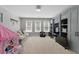 The bonus room features ample seating, built-in storage, and large windows for lots of natural light at 3883 Wakefield Hall Se Sq, Smyrna, GA 30080