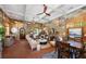 Stone walled clubhouse interior with brick floors, arched doorways, fireplace, and a comfortable seating arrangement at 3883 Wakefield Hall Se Sq, Smyrna, GA 30080