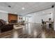 Spacious basement rec room with hardwood style flooring and a cozy fireplace at 4047 Jordan Lake Dr, Marietta, GA 30062