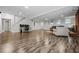 Finished basement with hardwood floors, large windows and a finished brick fireplace at 4047 Jordan Lake Dr, Marietta, GA 30062