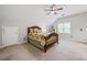 Charming bedroom with a ceiling fan, neutral paint, and natural light at 4047 Jordan Lake Dr, Marietta, GA 30062