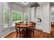 Bright dining area with natural light, built-in cabinets, and a view to the backyard at 4047 Jordan Lake Dr, Marietta, GA 30062