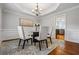 Dining room with a modern chandelier and stylish decor at 4047 Jordan Lake Dr, Marietta, GA 30062