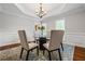 Dining room with a modern chandelier and stylish decor at 4047 Jordan Lake Dr, Marietta, GA 30062