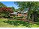Beautiful brick home featuring manicured landscaping and a well-maintained front yard at 4047 Jordan Lake Dr, Marietta, GA 30062