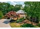 Beautiful two-story brick home with mature landscaping and a manicured lawn at 4047 Jordan Lake Dr, Marietta, GA 30062