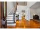 Spacious foyer with hardwood floors and an elegant staircase at 4047 Jordan Lake Dr, Marietta, GA 30062