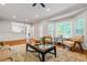 Inviting living room with hardwood floors, lots of natural light, and elegant trim at 4047 Jordan Lake Dr, Marietta, GA 30062