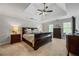 Spacious main bedroom features a trey ceiling, ceiling fan, carpeted floor, and large windows at 4047 Jordan Lake Dr, Marietta, GA 30062
