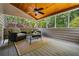 Cozy screened-in patio with comfortable seating, perfect for relaxation at 4047 Jordan Lake Dr, Marietta, GA 30062