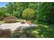 Backyard stone patio area for seating and outdoor enjoyment at 4047 Jordan Lake Dr, Marietta, GA 30062