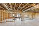 Unfinished basement with exposed beams and framing; ready for customization and personal touches at 413 Horizon Trl, Canton, GA 30114