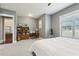 Bedroom featuring a neutral palette, soft carpeting, a bookcase, a desk and a telescope at 413 Horizon Trl, Canton, GA 30114