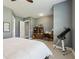 Cozy bedroom featuring a neutral palette, soft carpeting, and a telescope, perfect for relaxation and star-gazing at 413 Horizon Trl, Canton, GA 30114
