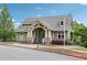 Inviting clubhouse with American flag in a friendly community setting at 413 Horizon Trl, Canton, GA 30114