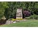 A stone marker in the well-manicured entrance of this community at 413 Horizon Trl, Canton, GA 30114