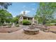 Exterior shot of clubhouse with outdoor fire pit and seating areas, great for entertaining at 413 Horizon Trl, Canton, GA 30114