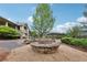 Outdoor stone fire pit provides an excellent place to relax and enjoy the view at 413 Horizon Trl, Canton, GA 30114