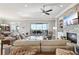 Spacious living room with stone fireplace, built-in shelves, and views of the outdoor living area at 413 Horizon Trl, Canton, GA 30114