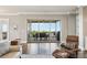 Large living room with comfortable seating and a view of the outdoor dining area at 413 Horizon Trl, Canton, GA 30114