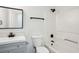 Bathroom with a shower and tub combo, with a new vanity and fixtures at 10423 Commons Xing, Jonesboro, GA 30238