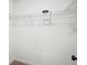 Walk-in closet features wire shelving for organized storage at 10423 Commons Xing, Jonesboro, GA 30238