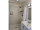 Modern bathroom featuring a walk-in shower with tile surround and sleek fixtures at 1513 Wildwood Dr, Acworth, GA 30102
