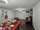Spacious game room with a pool table, seating, and decorative elements for entertainment at 1513 Wildwood Dr, Acworth, GA 30102