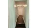 Hallway with hardwood floors and white trim at 1513 Wildwood Dr, Acworth, GA 30102