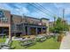 Exterior of a restaurant with a spacious patio, modern design, and outdoor seating at 476 Springer Nw Bnd, Marietta, GA 30060