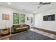Comfortable living room with modern decor, a large window, and hardwood floors at 476 Springer Nw Bnd, Marietta, GA 30060