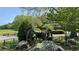Historic civil war cannon at Kennesaw Mountain National Battlefield Park with greenery and buildings in the background at 476 Springer Nw Bnd, Marietta, GA 30060