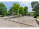 Spacious plaza with seating areas, mature trees, and well-maintained landscaping at 476 Springer Nw Bnd, Marietta, GA 30060
