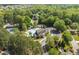 An aerial view features a community pool and well-manicured landscaping around the clubhouse and surrounding homes at 478 Vinings Estates Se Dr # B02, Smyrna, GA 30126