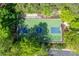 Overhead view of a community basketball court surrounded by mature trees in a neighborhood at 478 Vinings Estates Se Dr # B02, Smyrna, GA 30126