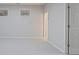 Spacious bedroom with neutral walls, carpet, and two windows at 478 Vinings Estates Se Dr # B02, Smyrna, GA 30126
