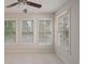 Bright bedroom featuring neutral carpet, and natural light through the many windows at 478 Vinings Estates Se Dr # B02, Smyrna, GA 30126