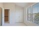 Bedroom with a double closet and natural light through the window at 478 Vinings Estates Se Dr # B02, Smyrna, GA 30126