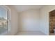 Bright bedroom with vaulted ceiling, large window with blinds, and ensuite bathroom at 478 Vinings Estates Se Dr # B02, Smyrna, GA 30126