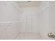 Empty walk-in closet with multiple shelves at 478 Vinings Estates Se Dr # B02, Smyrna, GA 30126