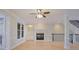 Spacious living room features a fireplace, hardwood floors, and neutral paint at 478 Vinings Estates Se Dr # B02, Smyrna, GA 30126