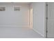A neutral living room with carpet and two windows allowing for natural light at 478 Vinings Estates Se Dr # B02, Smyrna, GA 30126